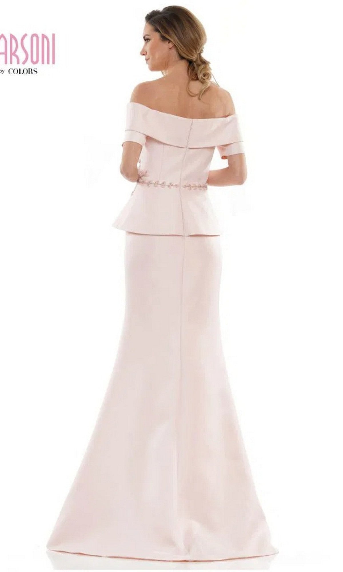 A woman is shown from the back wearing the Marsoni MV1144 long formal dress, featuring a light pink off-the-shoulder design, fitted bodice, beaded peplum detail, and flared skirt.